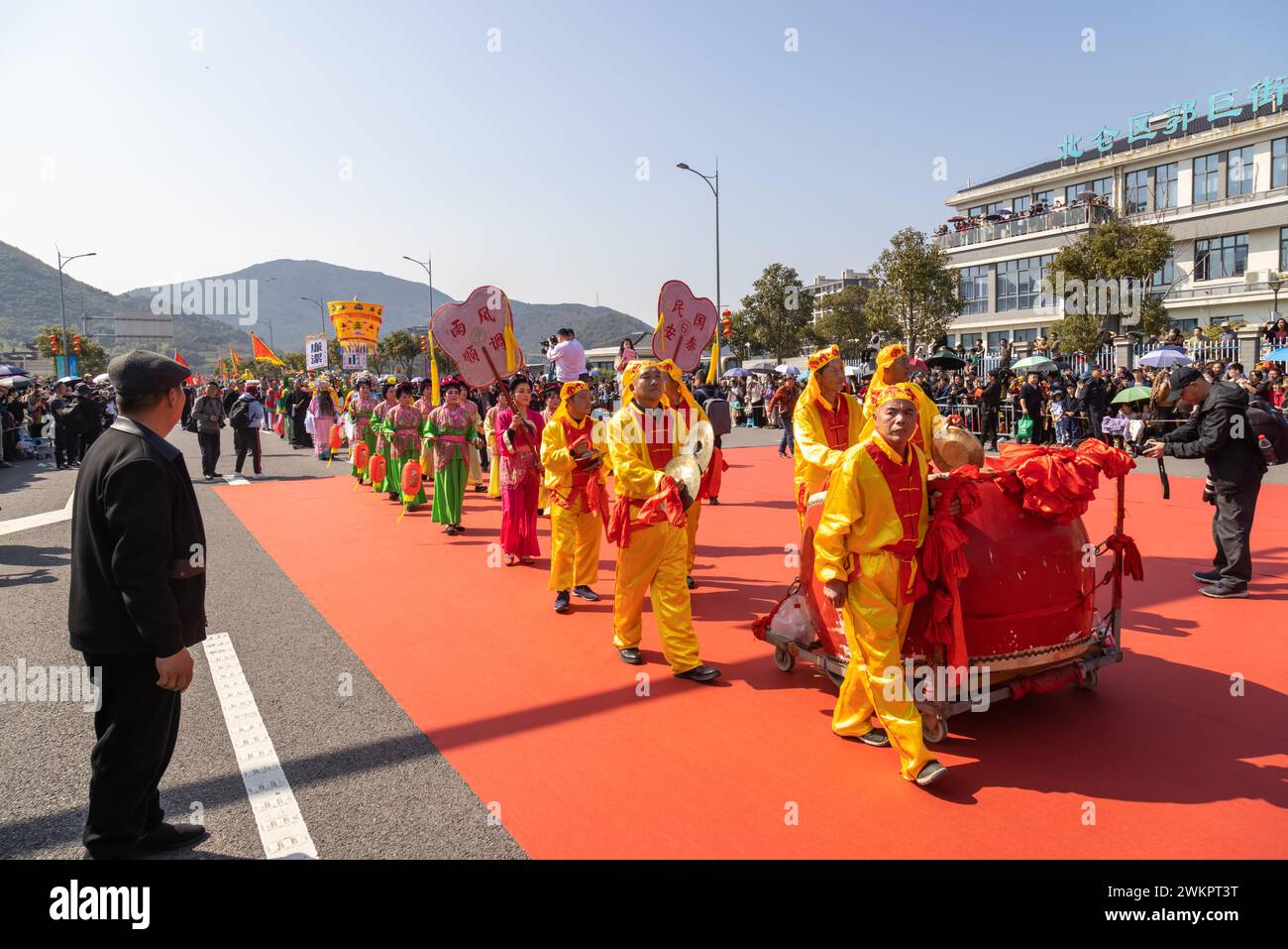 Folk actors perform on the street to welcome Lantern Festival in Ningbo City, east China's Zhejiang Province, 19 February, 2024. Stock Photo