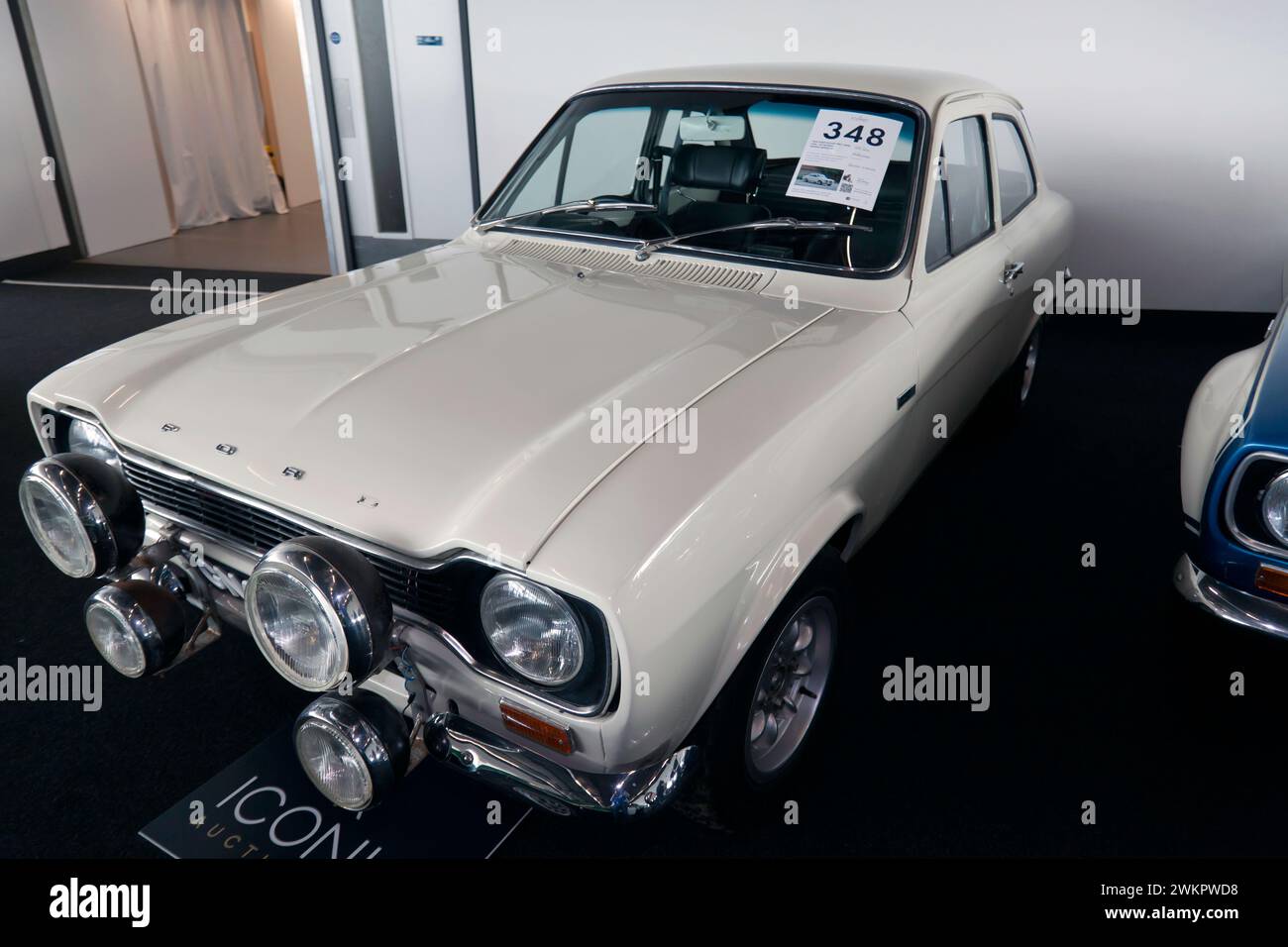 Three-quarters front view of a 1969, Ford Escort MK1 Twin Cam - Ex-Works Hannu Mikkola on sale in the Iconic Auction, at the 2023 Silverstone Festival Stock Photo