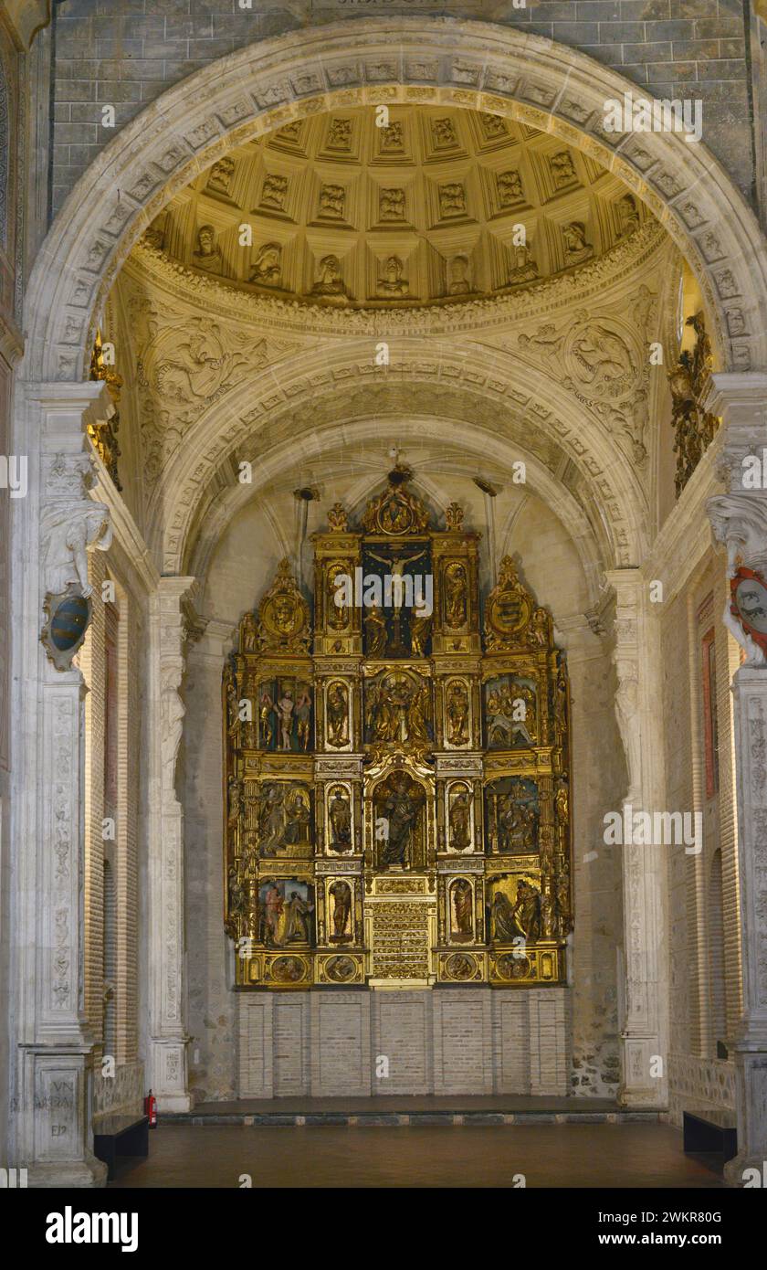 Spain, Toledo. Church of San Román. Built in Mudejar style in the 13th century. Altarpiece of the Main Chapel. Polychrome wood. Dated around 1552, its authorship is attributed to Diego Velasco de Avila, following the School of Berruguete. Stock Photo
