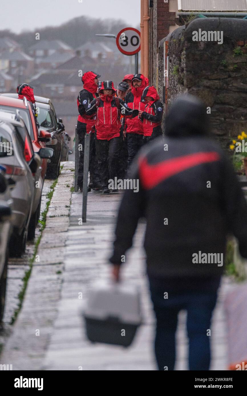Members of Dartmoor Rescue Group by the police cordon after a suspected ...