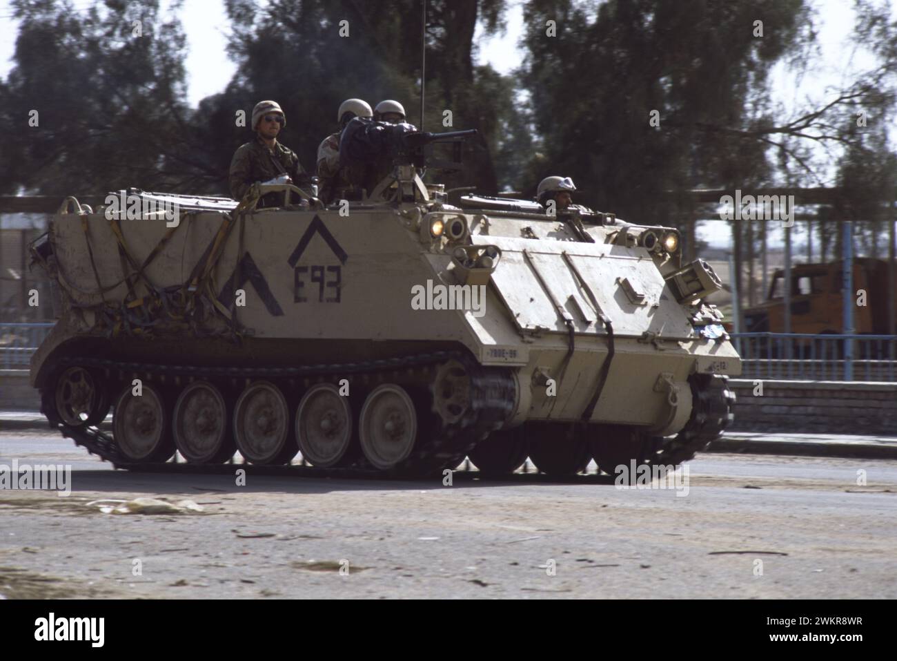 17th March 1991 A U.S. Army M113 Armored Personnel Carrier driving through Safwan in southern Iraq. Stock Photo