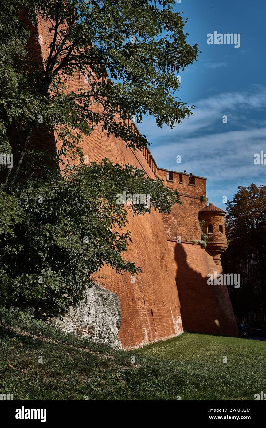 red brick castle wall in Krakow Stock Photo - Alamy