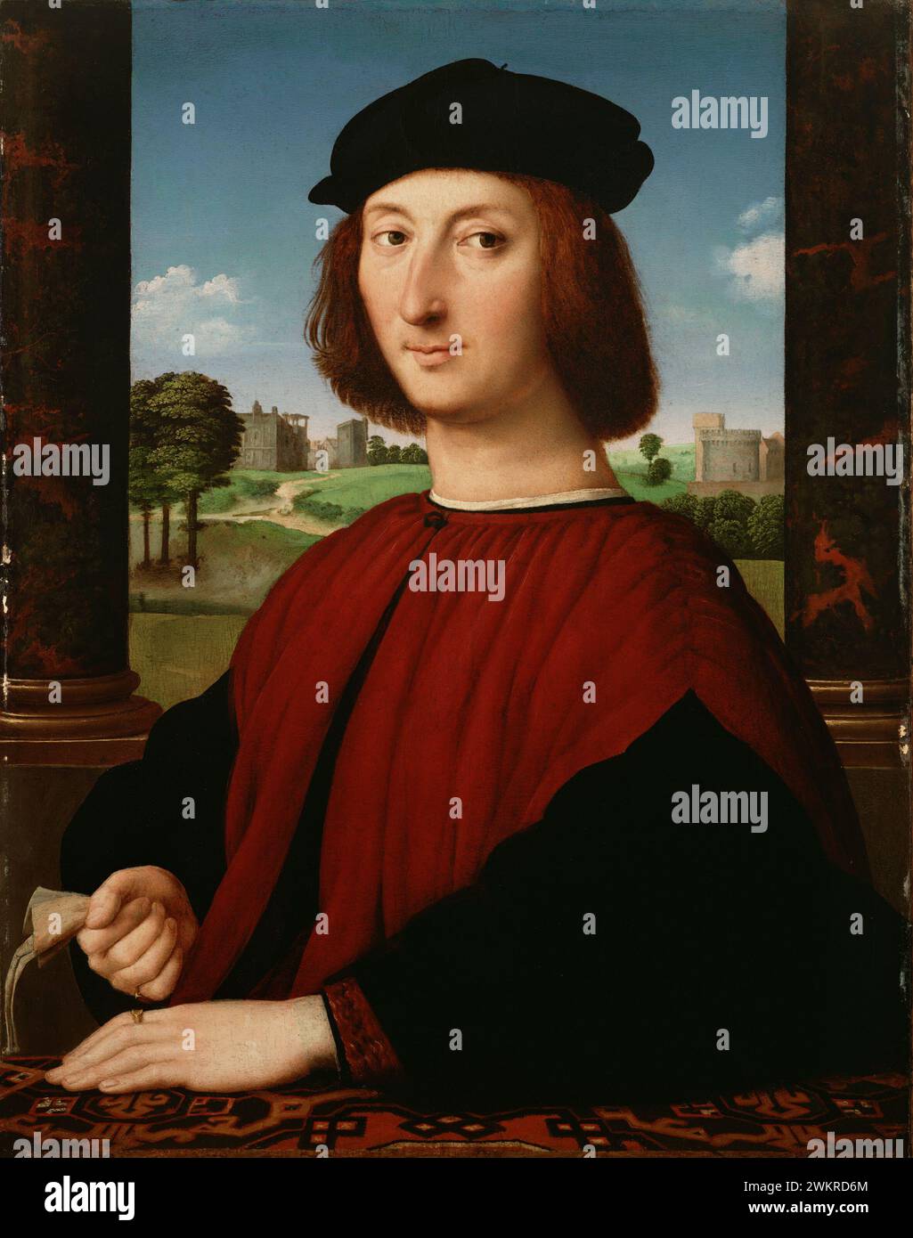 Portrait of a Young Man in Red; Circle of Raphael (Raffaello Sanzio) (Italian, 1483 - 1520); Italy; about 1505; Oil on panel; 67.3 × 52.7 cm (26 1/2 × 20 3/4 in.); 78.PB.364 Stock Photo