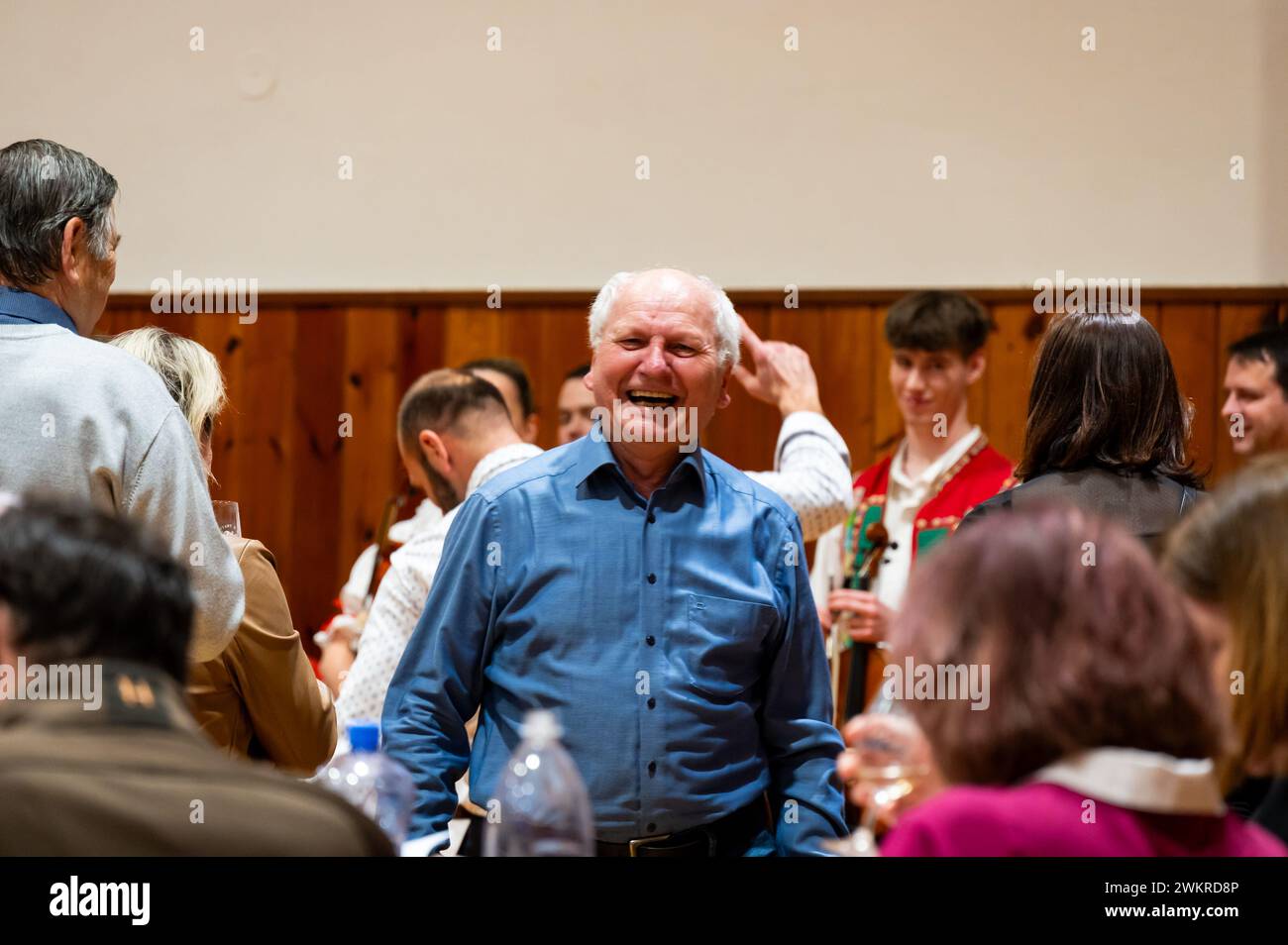 Hrusovany u Brna, Czech Republic - 17.2.2024: Wine degustation and wine tasting event. View of people drinking from glasses. South Moravia region, lan Stock Photo