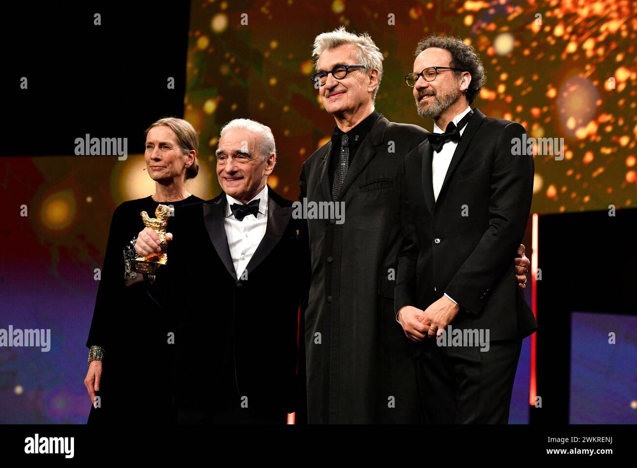 Mariette Rissenbeek, Martin Scorsese, Wim Wenders und Carlo Chatrian bei der Verleihung des Goldenen Ehrenbären an Martin Scorsese auf der Berlinale 2024 / 74. Internationale Filmfestspiele Berlin im Berlinale Palast. Berlin, 20.02.2024 Stock Photo