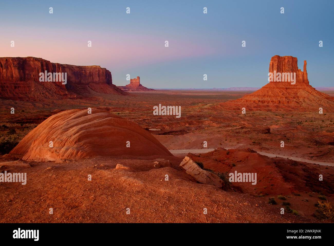Sunset in Monument Valley, which is famous for its iconic buttes ...