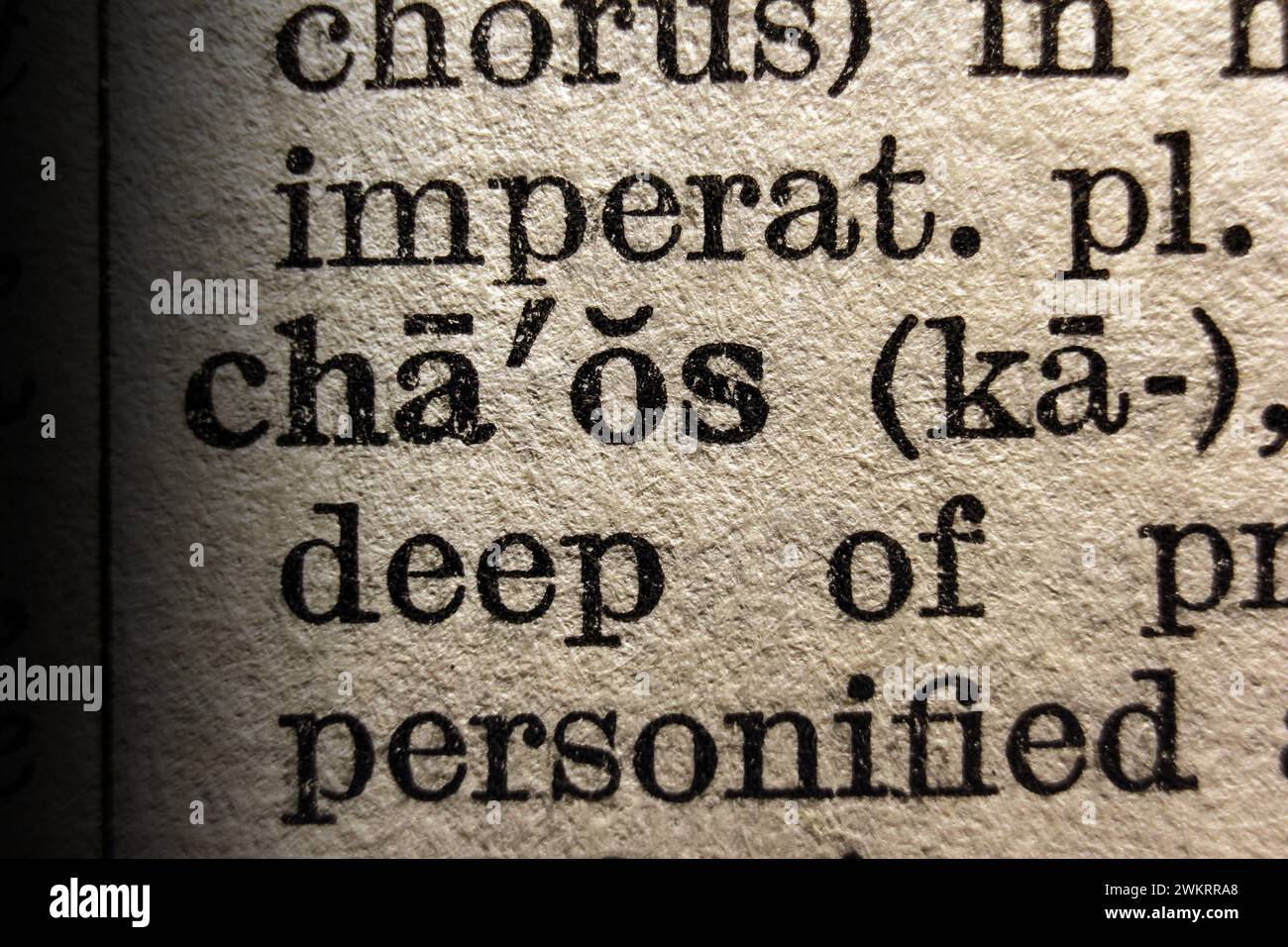 Definition of word chaos on dictionary page, closeup Stock Photo Alamy