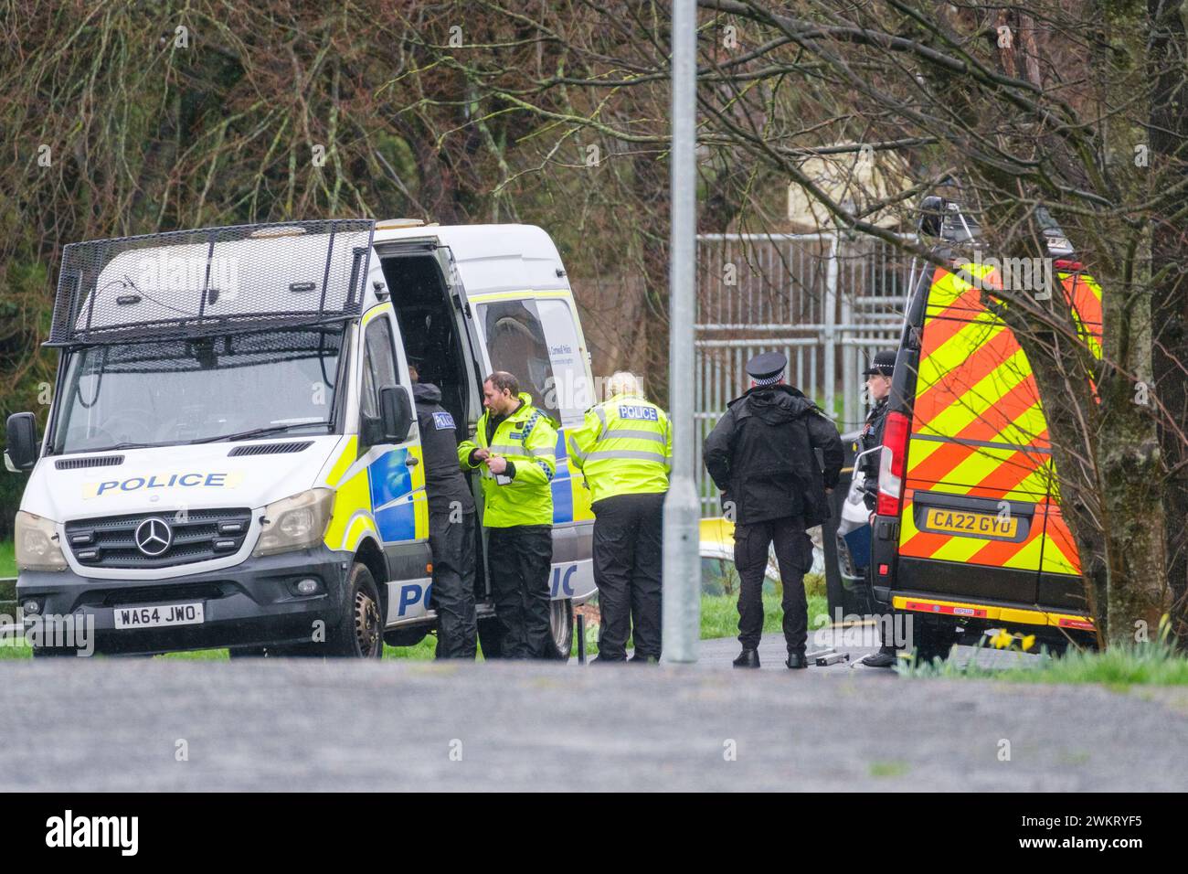 Police officers at a cordon after homes were evacuated when a suspected ...