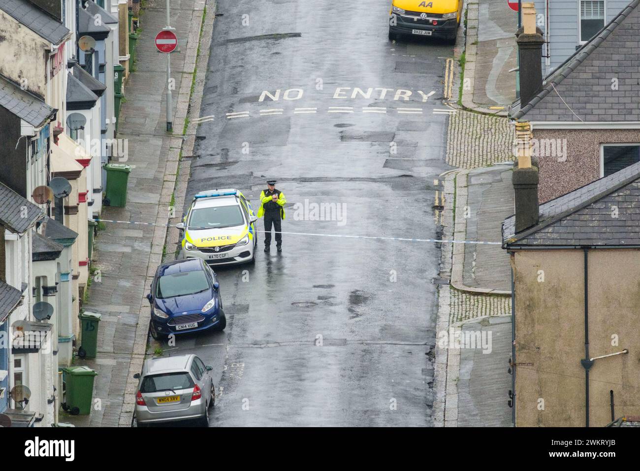 A police officer stands at a cordon after homes were evacuated when a ...