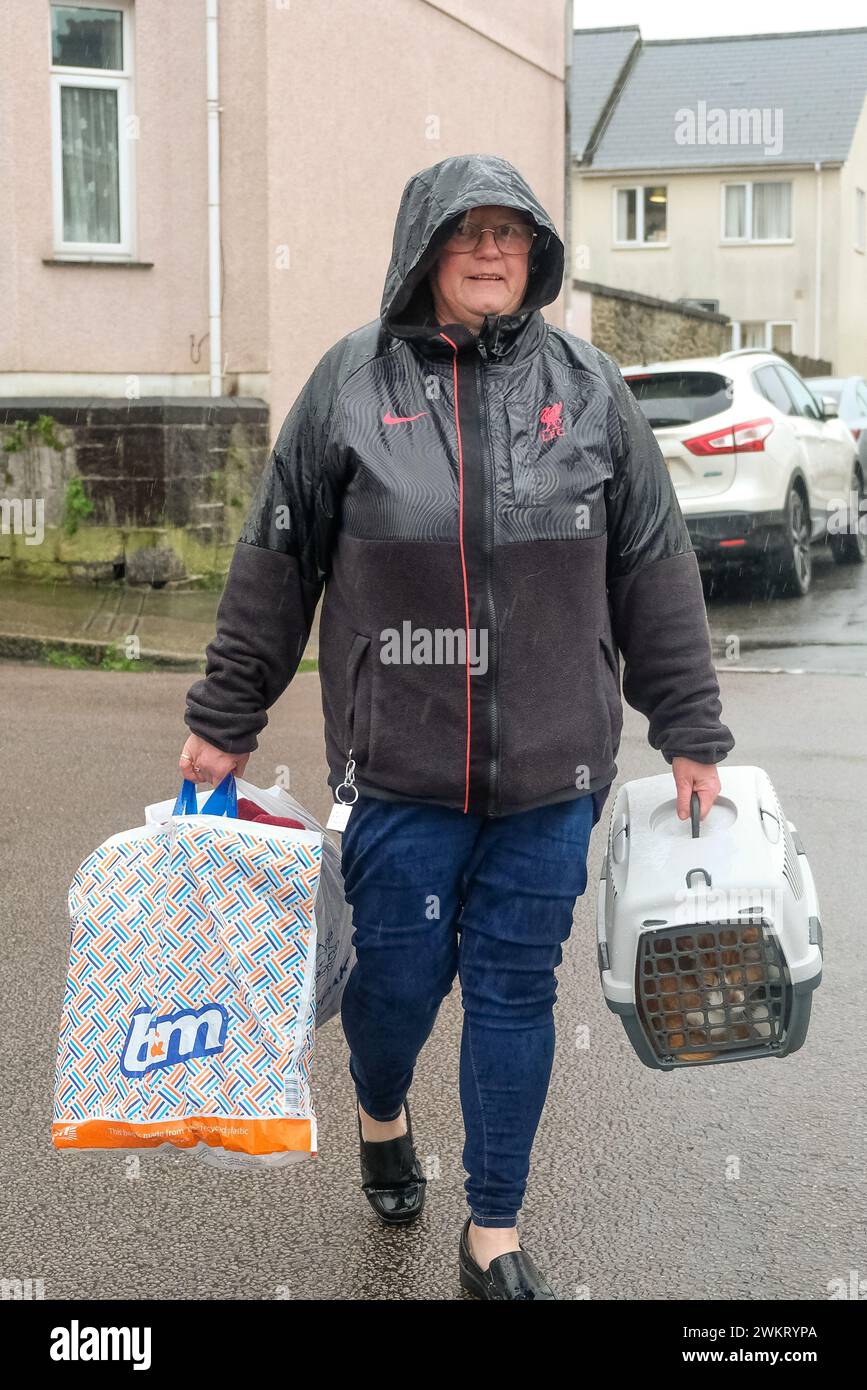 Teresa Cork and her cat being evacuated after a suspected Second World ...