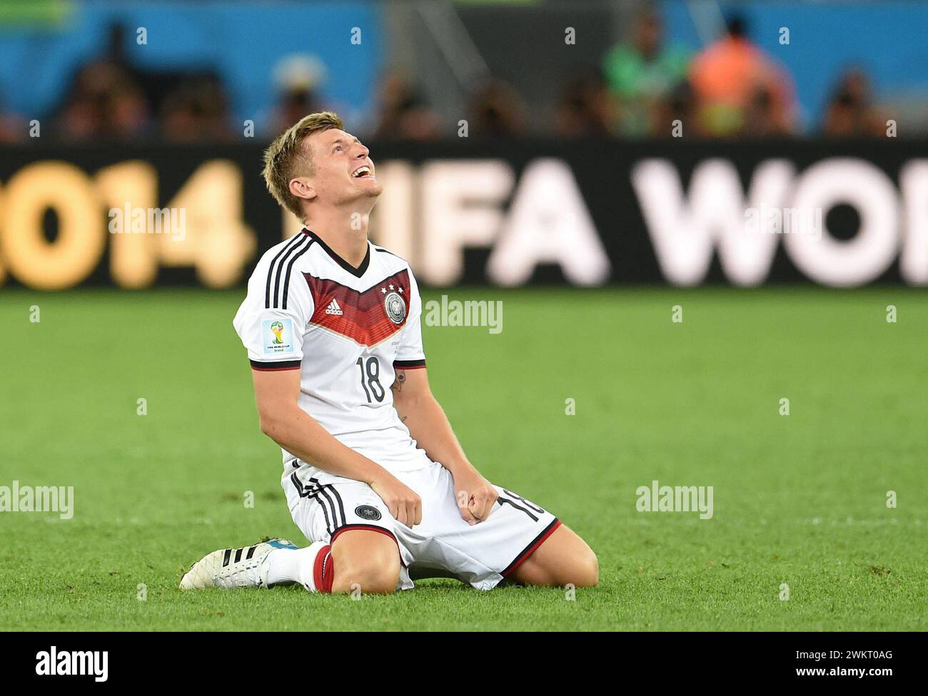 Rio De Janeiro, Brazil. 13th July, 2014. Soccer: World Cup 2014, Final, Argentina - Germany. Germany's Toni Kroos kneels on the pitch after the World Cup victory. Around three years after his retirement, Toni Kroos will once again play for the German national soccer team. Following a request from national coach Nagelsmann, he will 'play for Germany again from March', the 34-year-old Real Madrid midfielder announced on Instagram. Credit: dpa/Alamy Live News Stock Photo