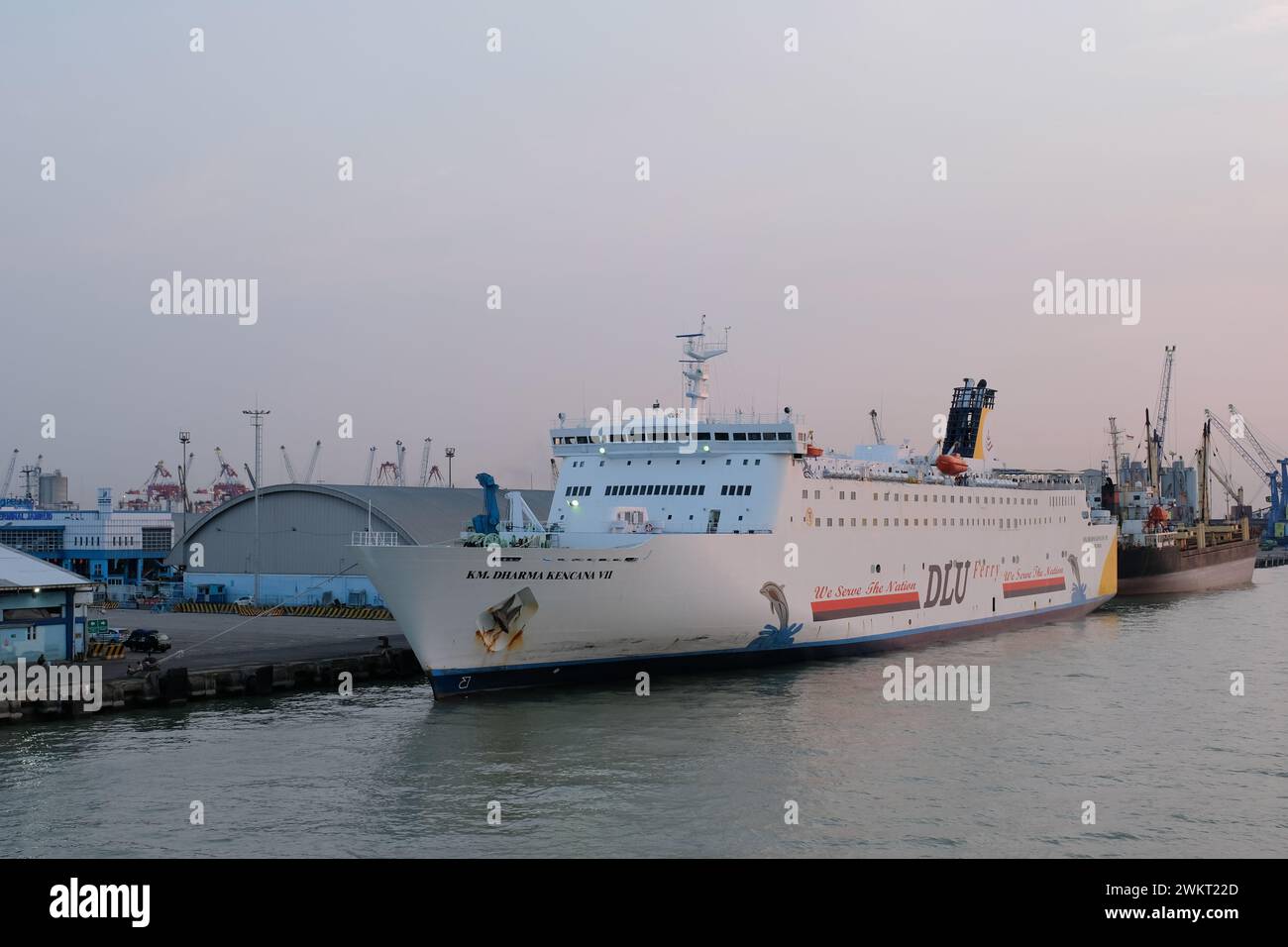 Surabaya, Indonesia, July 27, 2023: Large passenger ships dock at the port to load and unload passengers and goods. water transportation Stock Photo