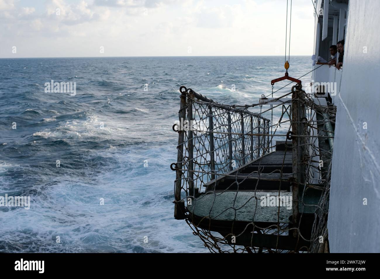 View of the ripples of the waves on the hull of the ship Stock Photo