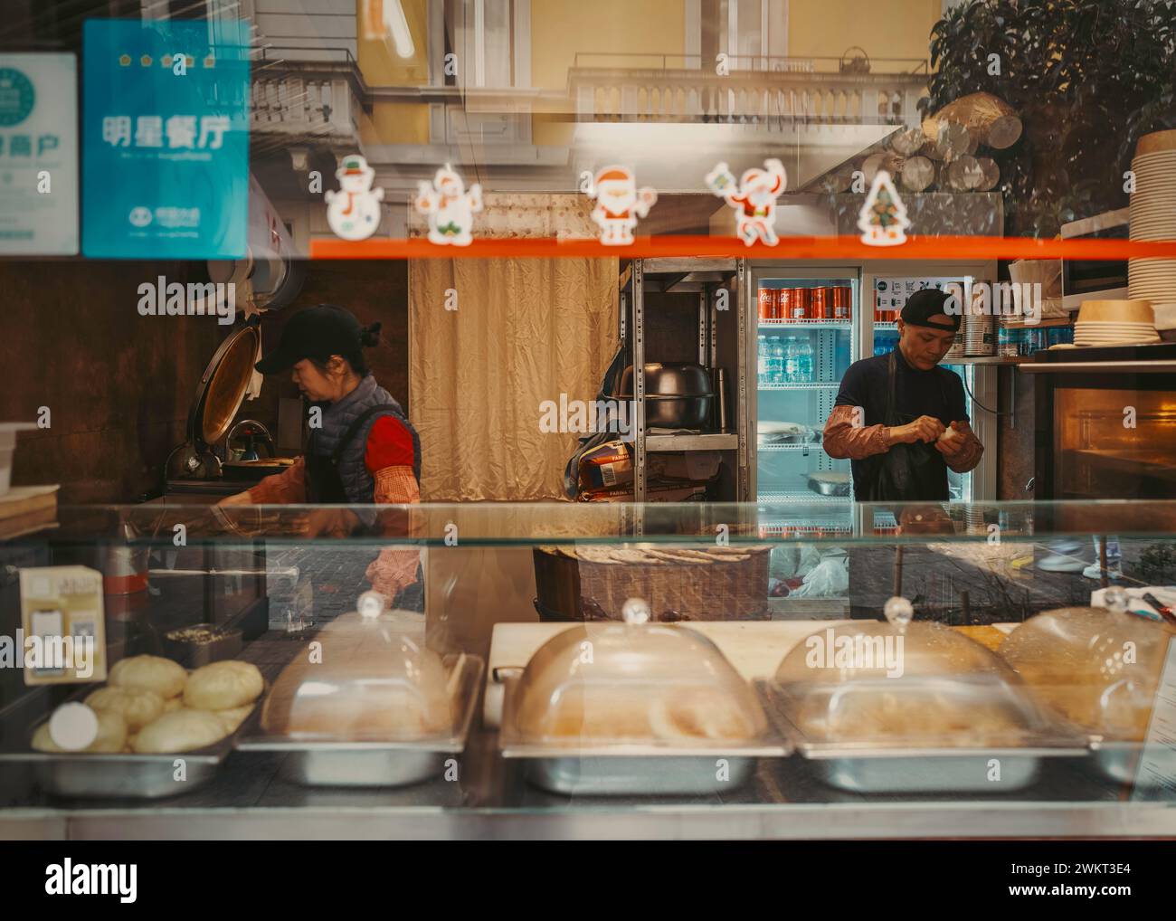 Immerse yourself in the vibrant tapestry of culture and flavor at Milan's Chinatown. A fusion of tradition and modernity awaits around every corner. Stock Photo