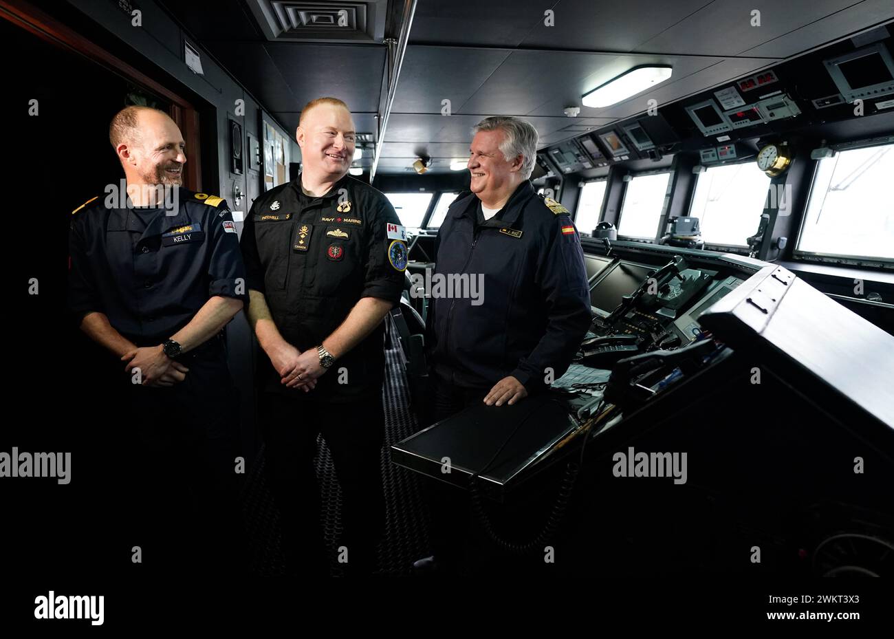 from left to right, Commodore Simon Kelly of the Royal Navy, deputy commander UK Strike Force, Rear Admiral David Patchell, vice commander US Second Fleet and Rear Admiral Joaquin Ruiz Escagedo, Commander of Standing Nato Maritime Group One on the bridge of the ESPS Almirante Juan de Borbon which is berthed at the Port of Southampton, and is the flagship of Standing Nato Maritime Group One. SNMG1, made up of five Alliance warships, while conducting the first major live exercise of Exercise Steadfast Defender 24 took part in gunnery exercises, as well as air defence simulations, alongside a Spa Stock Photo