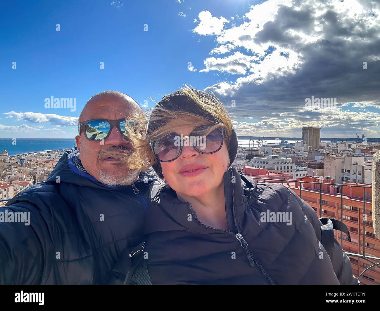Selfie portrait of couple tourists in Alicante, Spain Stock Photo