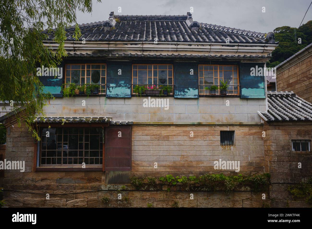 Nestled alongside the Perry Road canal, the Sogabo Art Gallery stands as one of the most charming and beloved cafes in the area  in Shimoda, Japan. Stock Photo