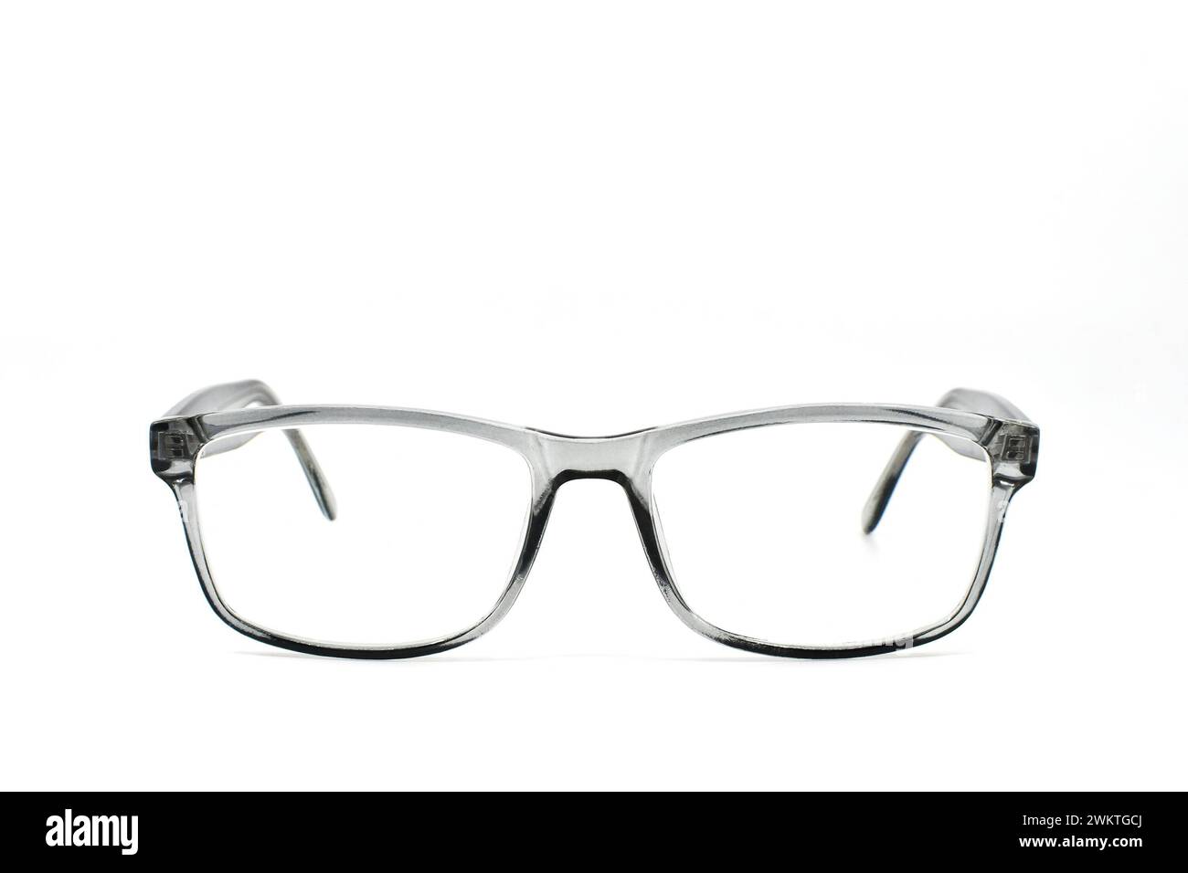 Pair of glasses with grey frames isolated on a plain white background. Copy space Stock Photo