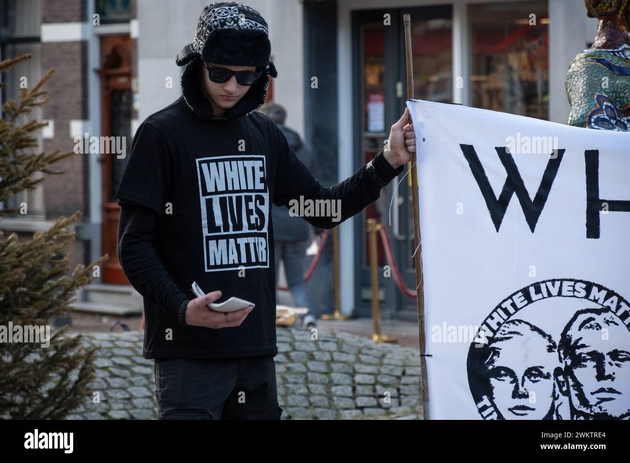 Gouda, Netherlands 17.02.24. Dutch faction of far right wing movement White Lives Matter perform public demonstration protest in city centre. Stock Photo