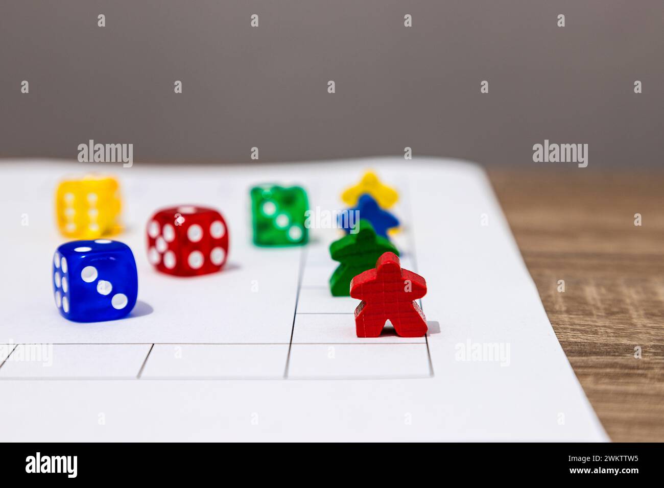 Strategy board game with colorful tokens and dice ready for play Stock