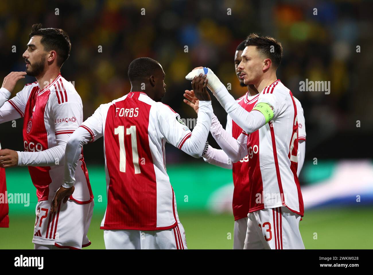 BODØ - (l-r) Josip Sutalo of Ajax, Carlos Forbs of Ajax, Steven Berghuis of Ajax celebrate the 0-1 during the UEFA Conference League play-off match between FK Bodø/Glimt and Ajax Amsterdam at the Aspmyra Stadium on February 22, 2024 in Bodø, Norway. ANP VINCENT JANNINK Stock Photo