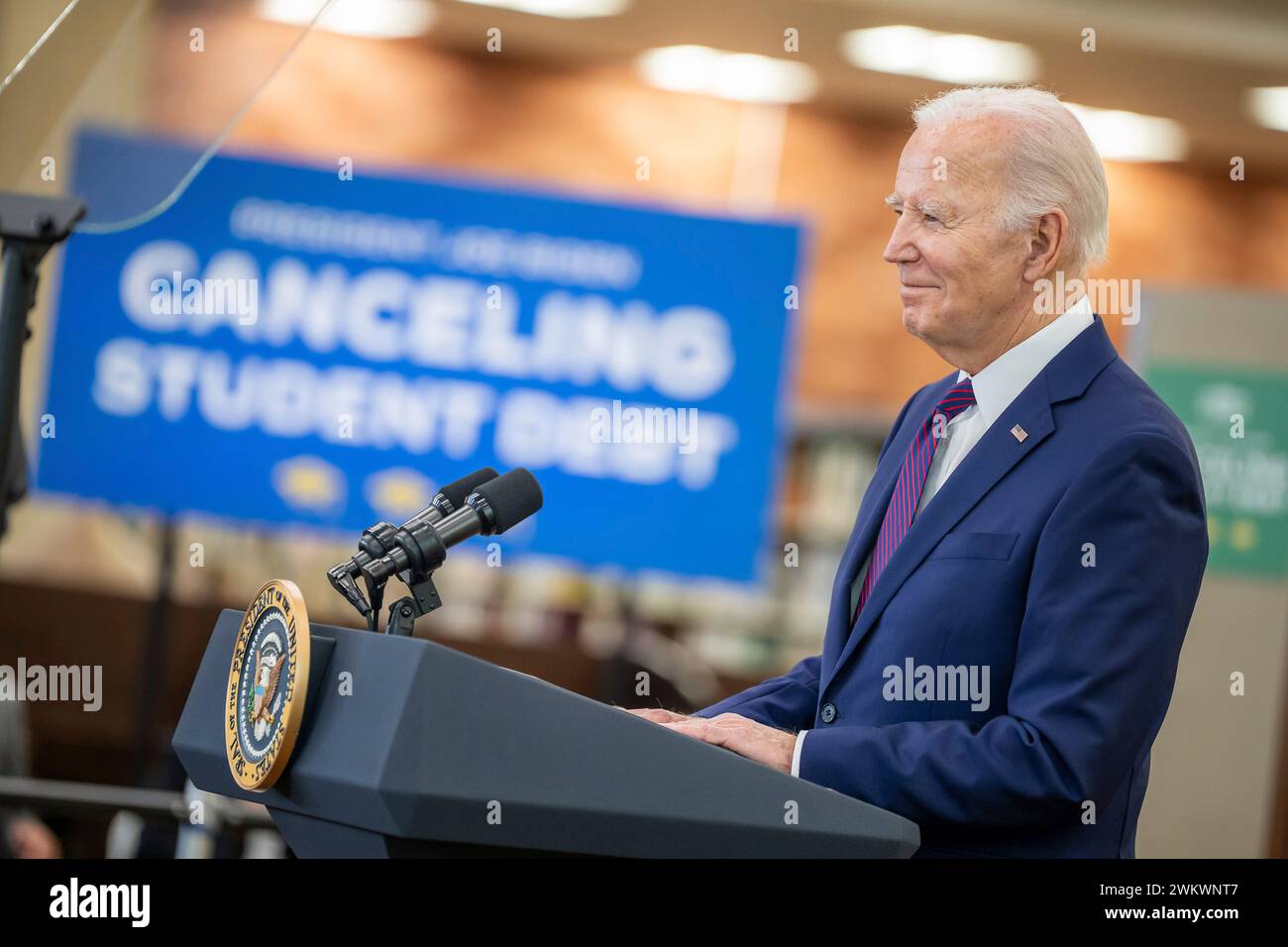 Culver City, United States of America. 21 February, 2024. U.S President Joe Biden delivers remarks during an event at the Julian Dixon Library, February 21, 2024 in Culver City, California. Biden announced the cancellation of $1.2 billion in student loan debt for more than 150,000 borrowers during the event. Credit: Adam Schultz/White House Photo/Alamy Live News Stock Photo