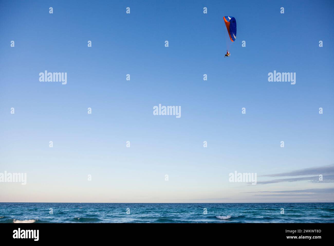 Paraglider flying over the ocean, Dania Beach, Florida, USA Stock Photo
