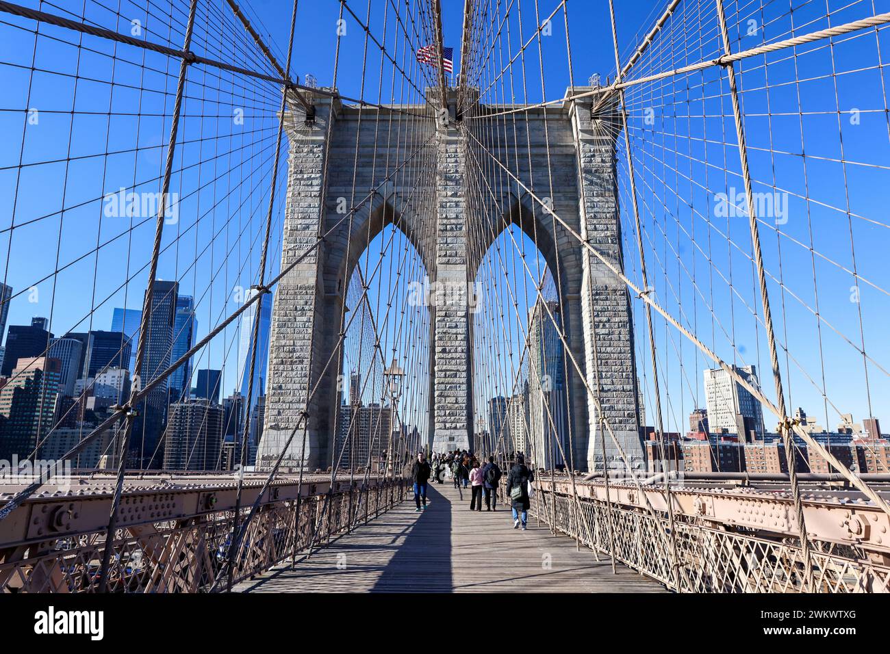 People Walk Across The Brooklyn Bridge On A Winter Day In New York City   People Walk Across The Brooklyn Bridge On A Winter Day In New York City New York Saturday Feb 3 2024 Photo Gordon Donovan 2WKWTXG 