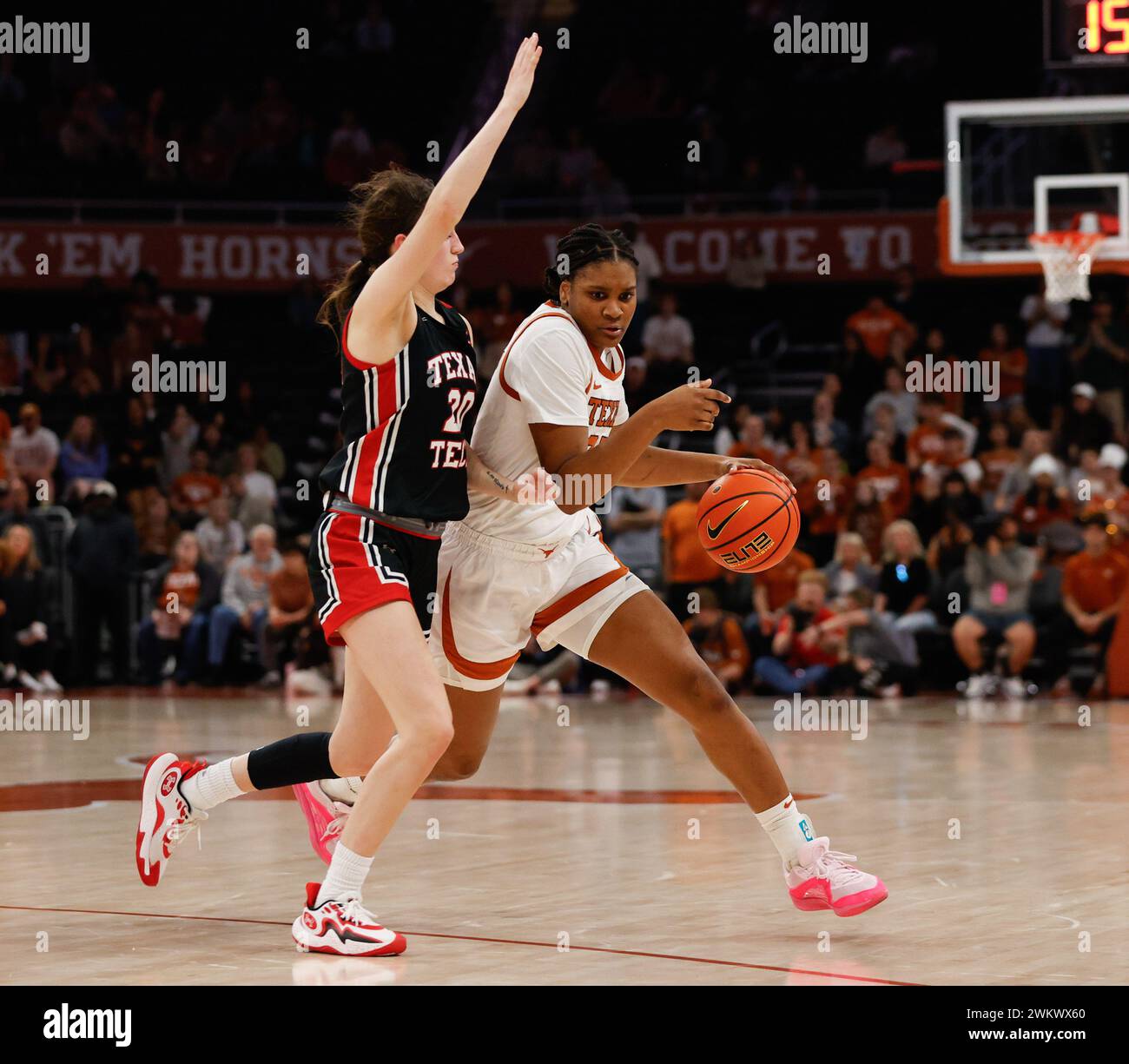 February 21, 2024: Texas forward Madison Booker (35) moves the ball against Texas Tech guard Bailey Maupin (20) during a Big 12 women's basketball game between the Texas Longhorns and the Texas Tech Red Raiders on February 21, 2024. Texas won, 77-72. (Credit Image: © Scott Coleman/ZUMA Press Wire) EDITORIAL USAGE ONLY! Not for Commercial USAGE! Stock Photo