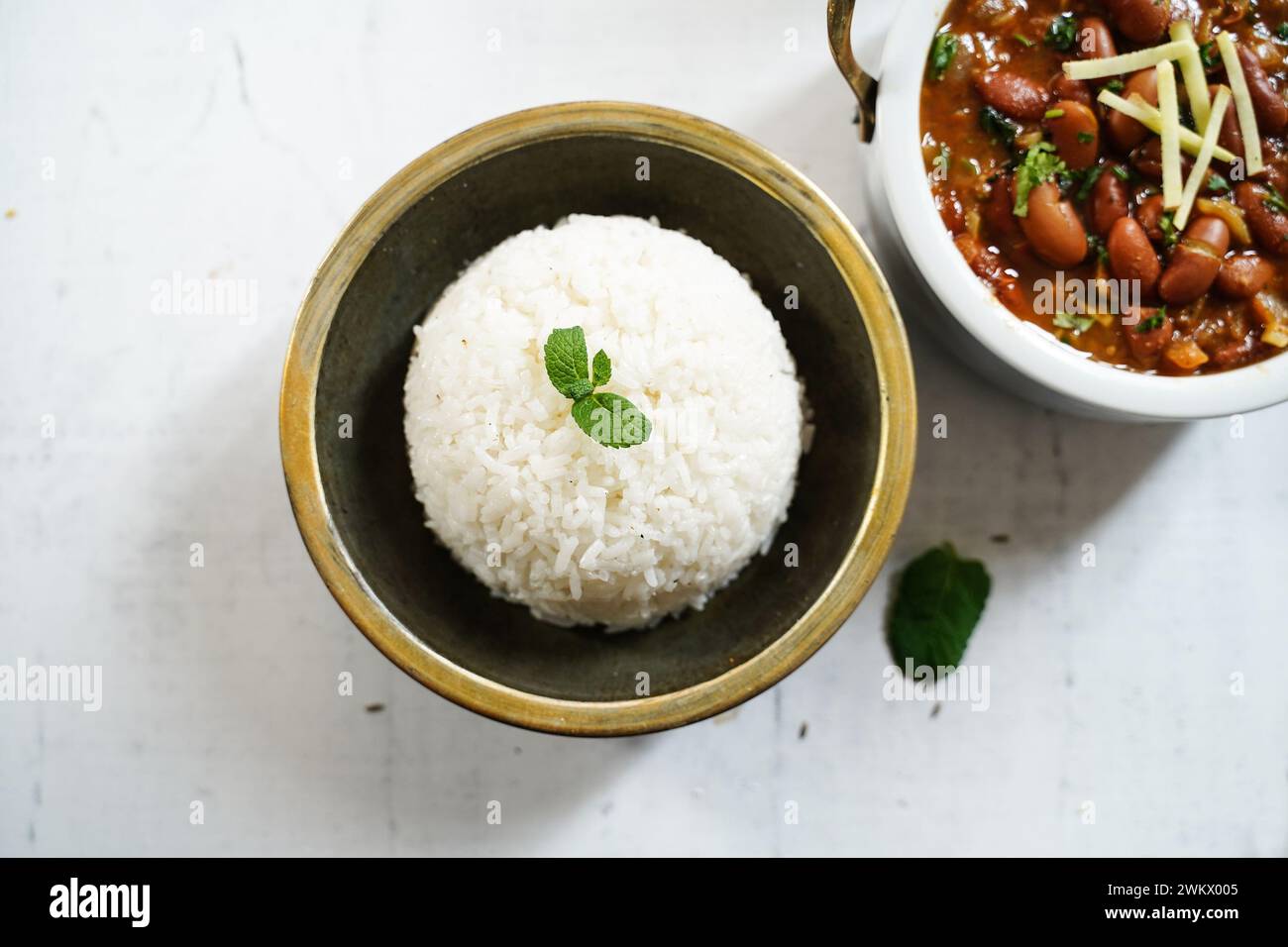 Cooked Thai Jasmine rice served with kidney beans curry Stock Photo