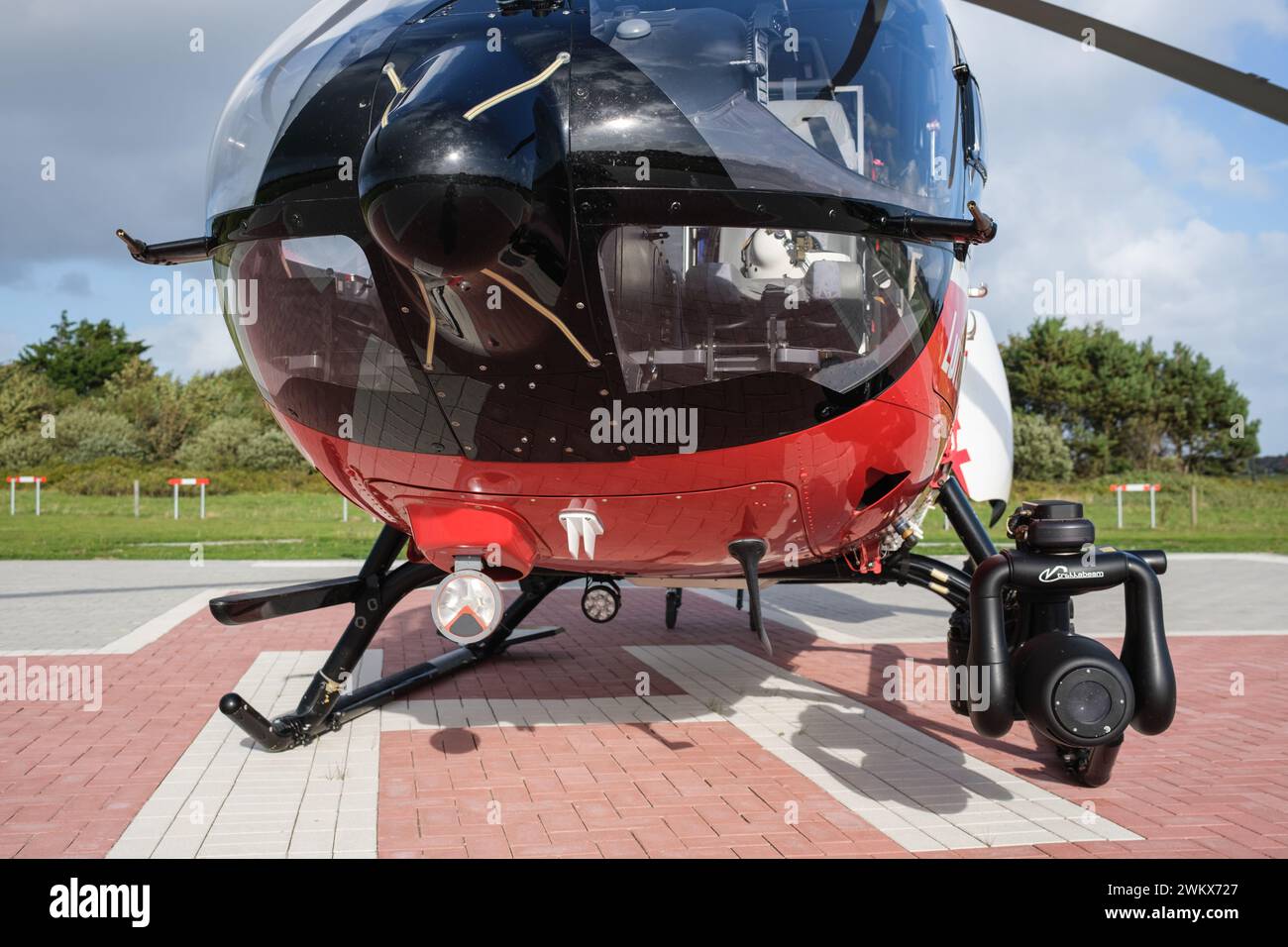 Rescue helicopter in action, Rettungshubschrauber und Notarzt im Einsatz auf der Insel Amrum Stock Photo