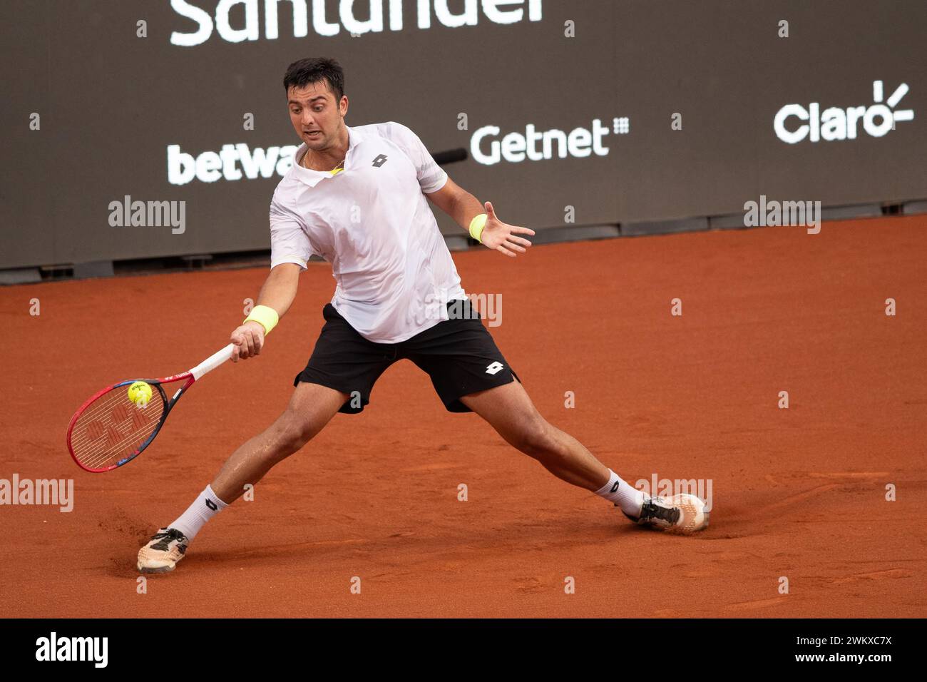 Rio De Janeiro, Brazil. 22nd Feb, 2024. Marcelo Tomas Barrios Vera of Chile hits a return during the round 16 match against Cameron Norrie of Britain at the 2024 ATP500 Rio Open at Jockey Club Brasileiro in Rio de Janeiro, Brazil, Feb. 22, 2024. Credit: Wang Tiancong/Xinhua/Alamy Live News Stock Photo