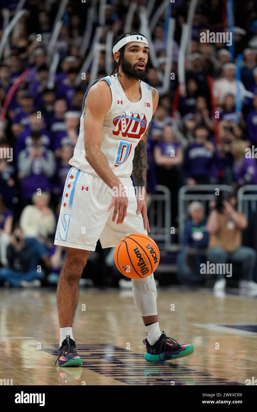 Northwestern Guard Boo Buie Dribbles The Ball During The First Half Of ...