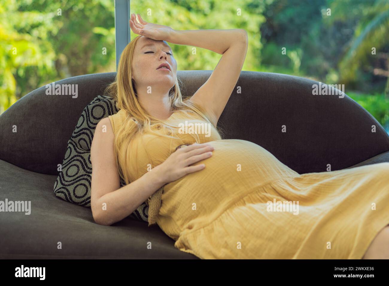 pregnant woman experiences a fainting spell, highlighting the