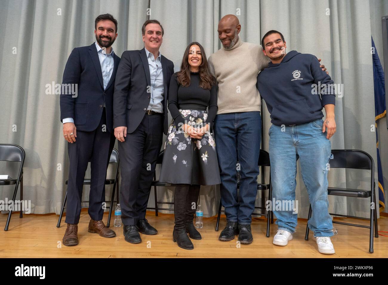 New York, United States. 22nd Feb, 2024. NEW YORK, NEW YORK - FEBRUARY 22: Rep. Alexandria Ocasio-Cortez (C) poses with New York State Assembly Member Zohran Mamdani, New York State Senator Michael Gianaris, Mychal Johnson and Daniel Lozano when she holds a Town Hall to deliver remarks after five years of the Green New Deal at Astoria's PS 171Q on February 22, 2024 in the Queens borough of New York City. Credit: Ron Adar/Alamy Live News Stock Photo