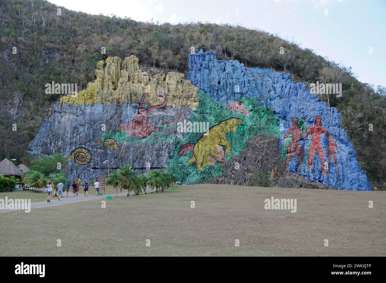 Mural de la Prehistoria, prehistoric wall, painted in 1961 by Mexican artist Leovigildo Gonzalez Morillo, size 120x180 metres, Vinales, Unesco World Stock Photo