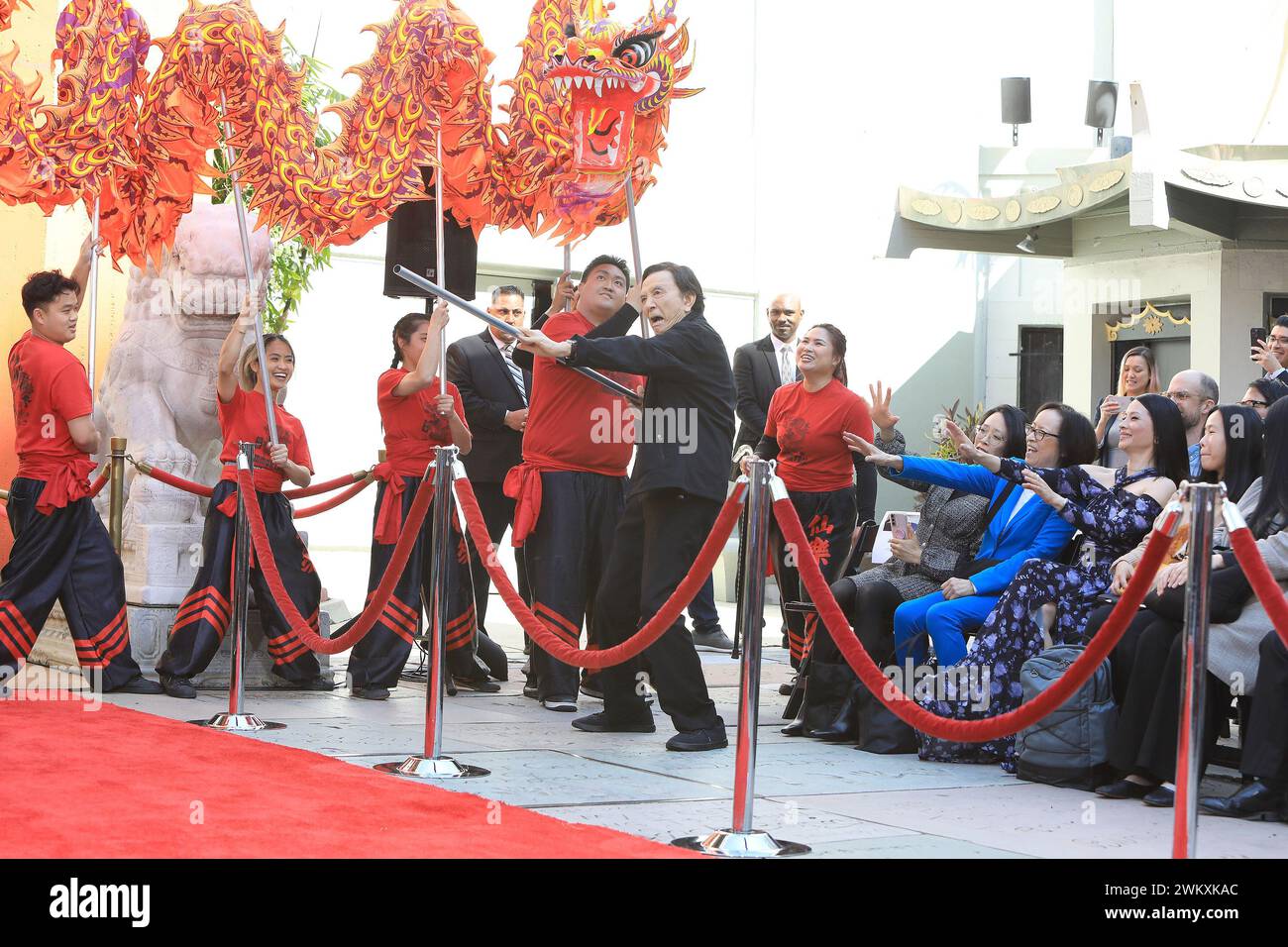 February 22, 2024, Los Angeles, California, USA: LOS ANGELES, CA - FEBRUARY 22, 2024: General Atmosphere, Dragon Dancers, James Hong, Lucy Liu at a ceremony honoring actor James Hong with hand and foot prints on his 95th birthday at the TCL Chinese Theatre IMAX. (Credit Image: © Nina Prommer/ZUMA Press Wire) EDITORIAL USAGE ONLY! Not for Commercial USAGE! Stock Photo