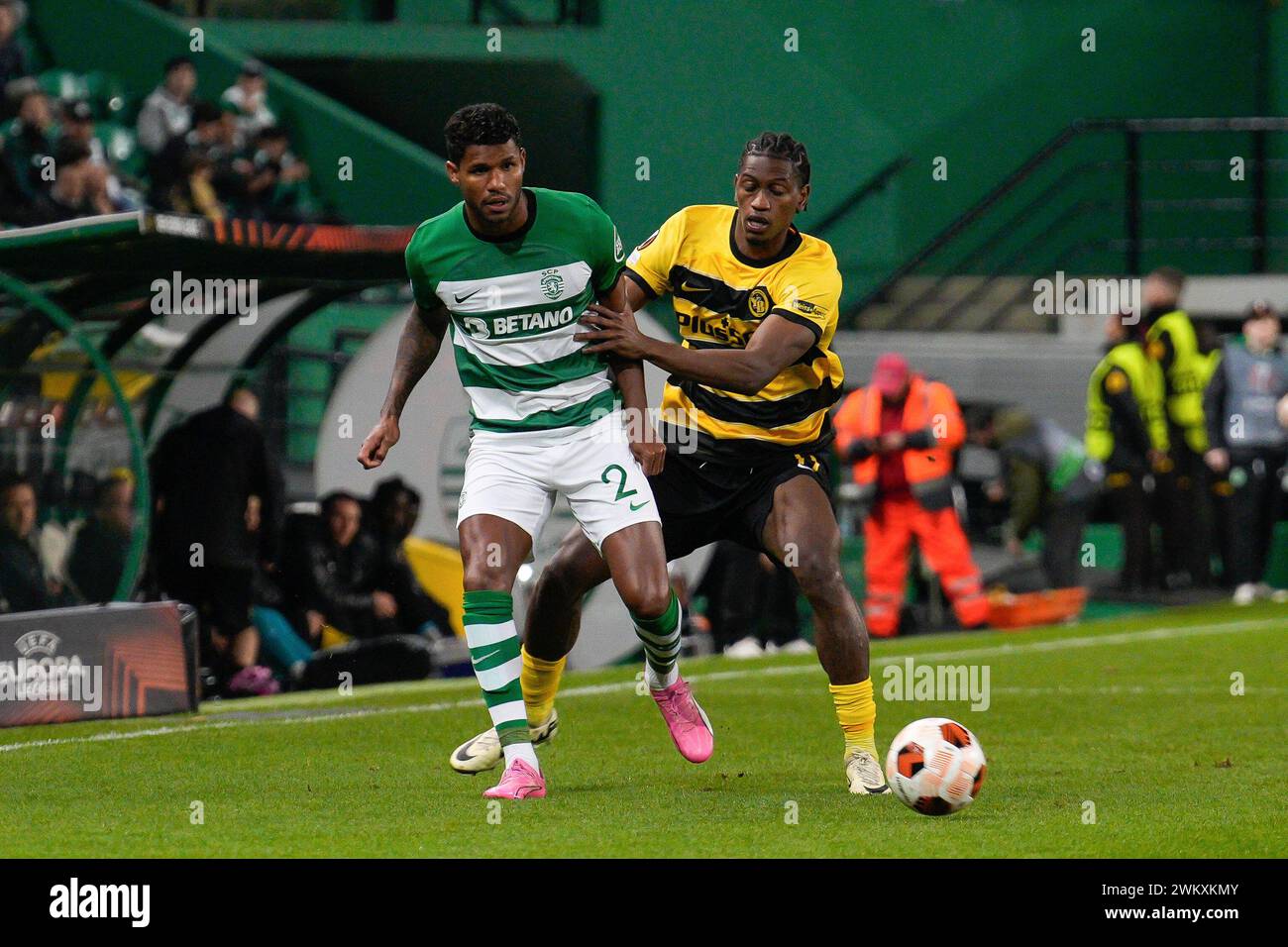 Lisbon, Portugal. 22nd Feb, 2024. Matheus Reis of Sporting CP (L) and Joel Monteiro of BSC Young Boys (R) in action during the UEFA Europa League Play-off 2nd leg football match between Sporting CP and BSC Young Boys at Estadio Jose Alvalade. Final Score: Sporting CP 1:1 BSC Young Boys (Photo by Bruno de Carvalho/SOPA Images/Sipa USA) Credit: Sipa USA/Alamy Live News Stock Photo