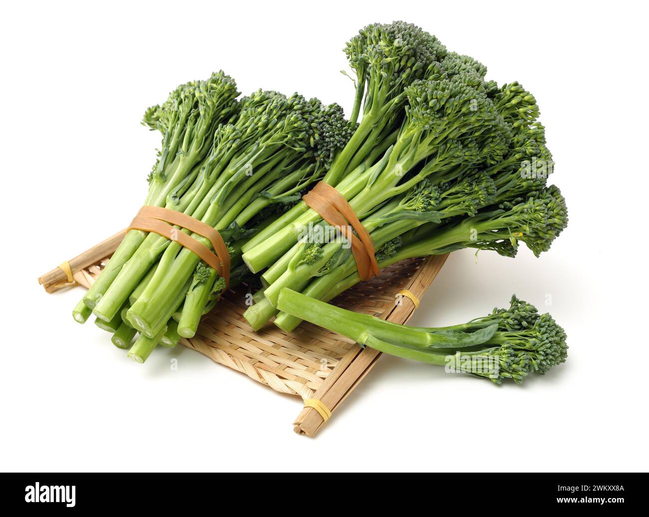broccolini baby broccoli on white background Stock Photo - Alamy
