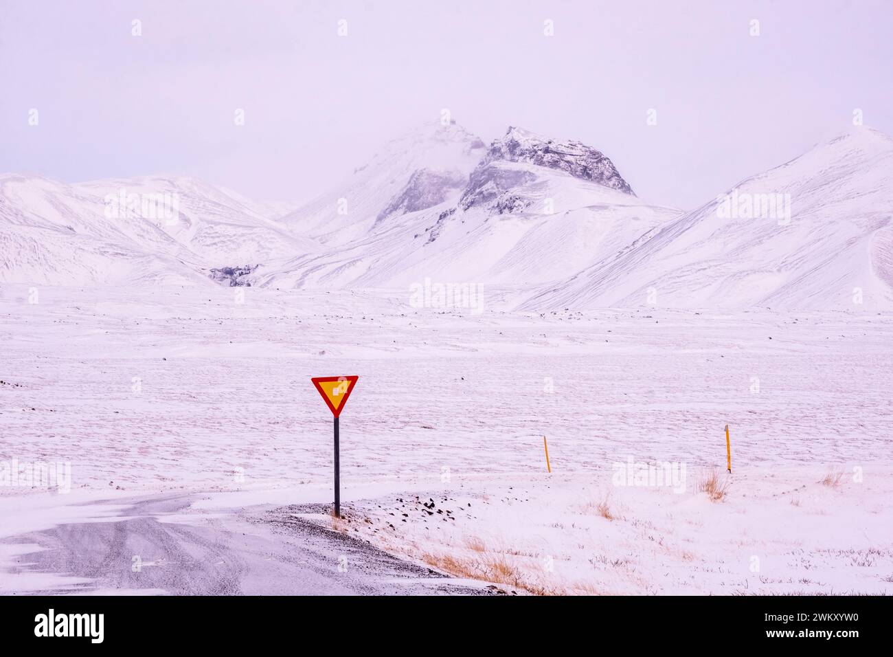 Road sign on a snow-covered road outside Thingvellir National Park in Iceland Stock Photo