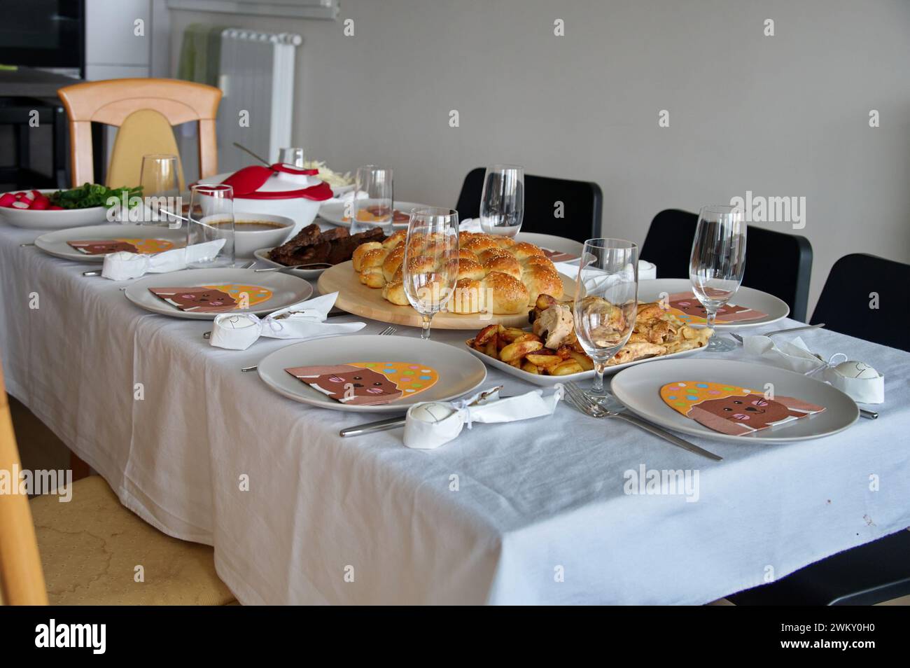 Decorated table served for Easter dinner Stock Photo