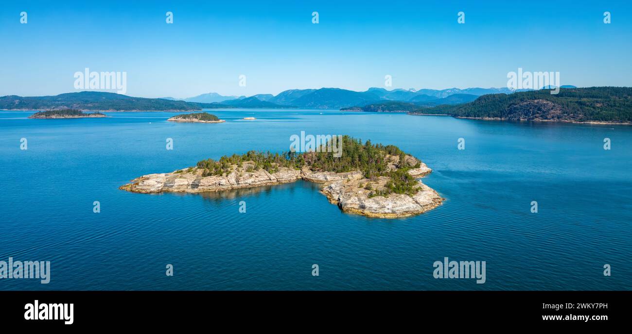Rocky Island in Strait of Georgia. Powell River, BC, Canada. Stock Photo