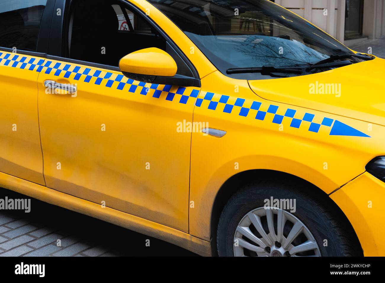Yellow Taxi Cab. Taxi car on the street of Istanbul Turkey. Turkish taxi on the way, Istanbul taxi routes are on duty. Travel photo, street view Stock Photo