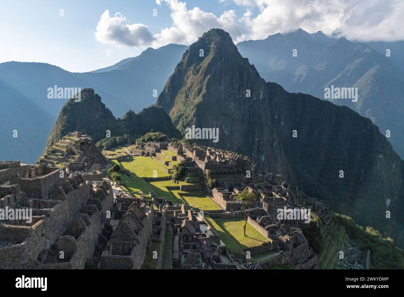 A view of Machu Picchu citadel lost city ruins and Huayna Picchu in Per Stock Photo