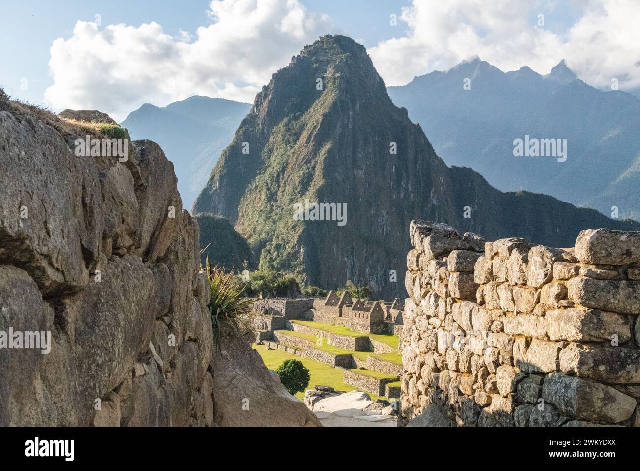 A view of Machu Picchu citadel lost city ruins and Huayna Picchu in Per Stock Photo