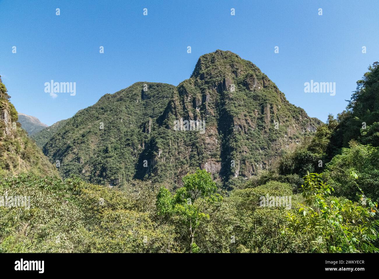 A view of the forest mountain landscape in the Sacred Valley at Aguas Calientes in Peru Stock Photo