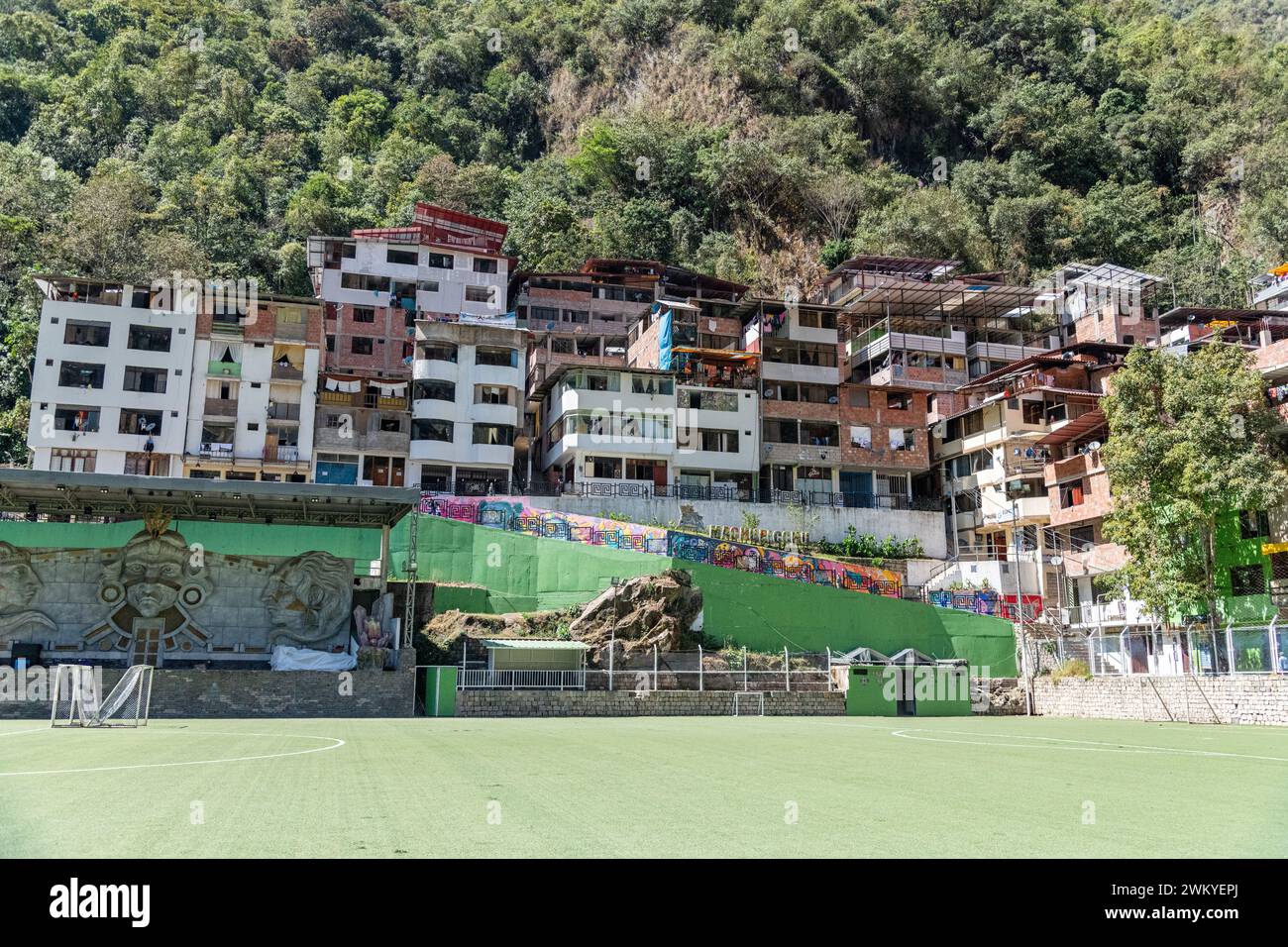A view of apartments / buildings above a football pitch in Aguas Calientes, Peru Stock Photo Alamy