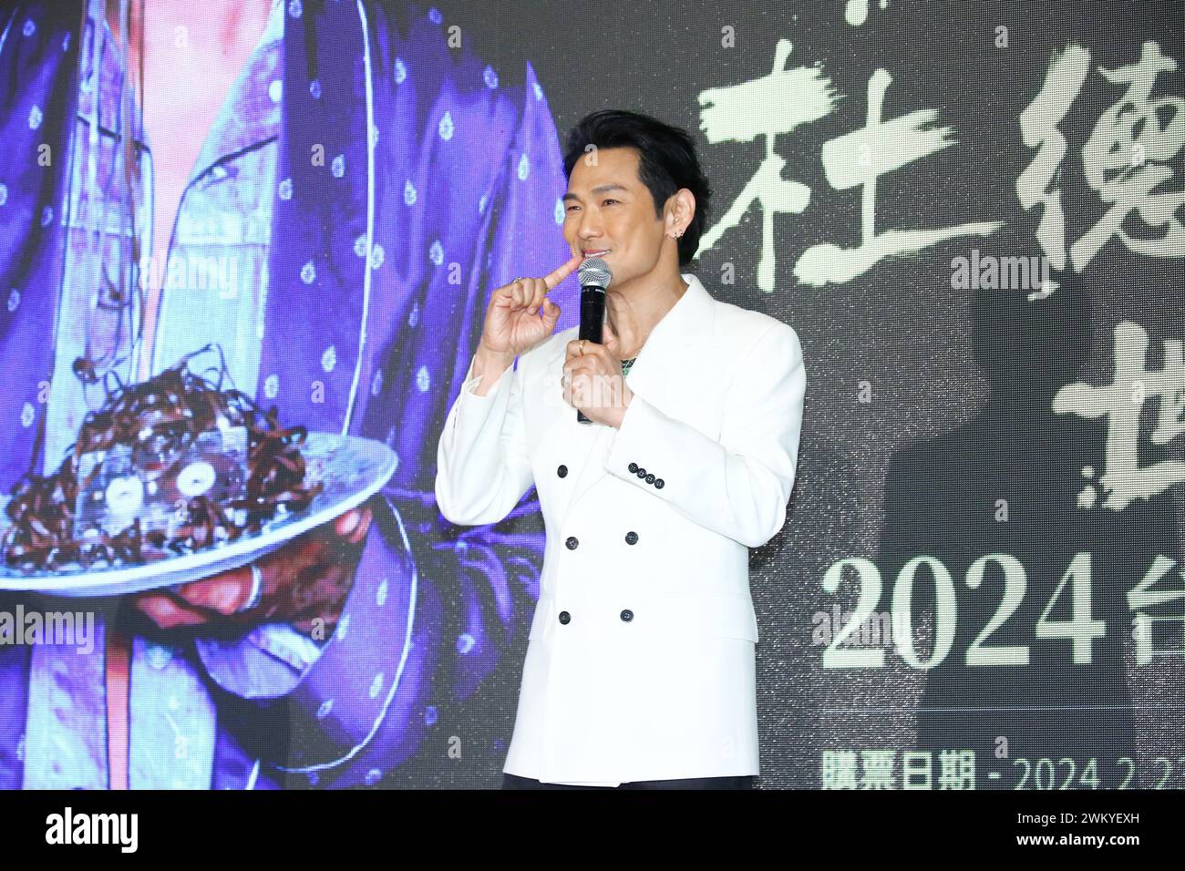 Hong Kong and Taiwan-based singer and actor Alex To attends a concert ...