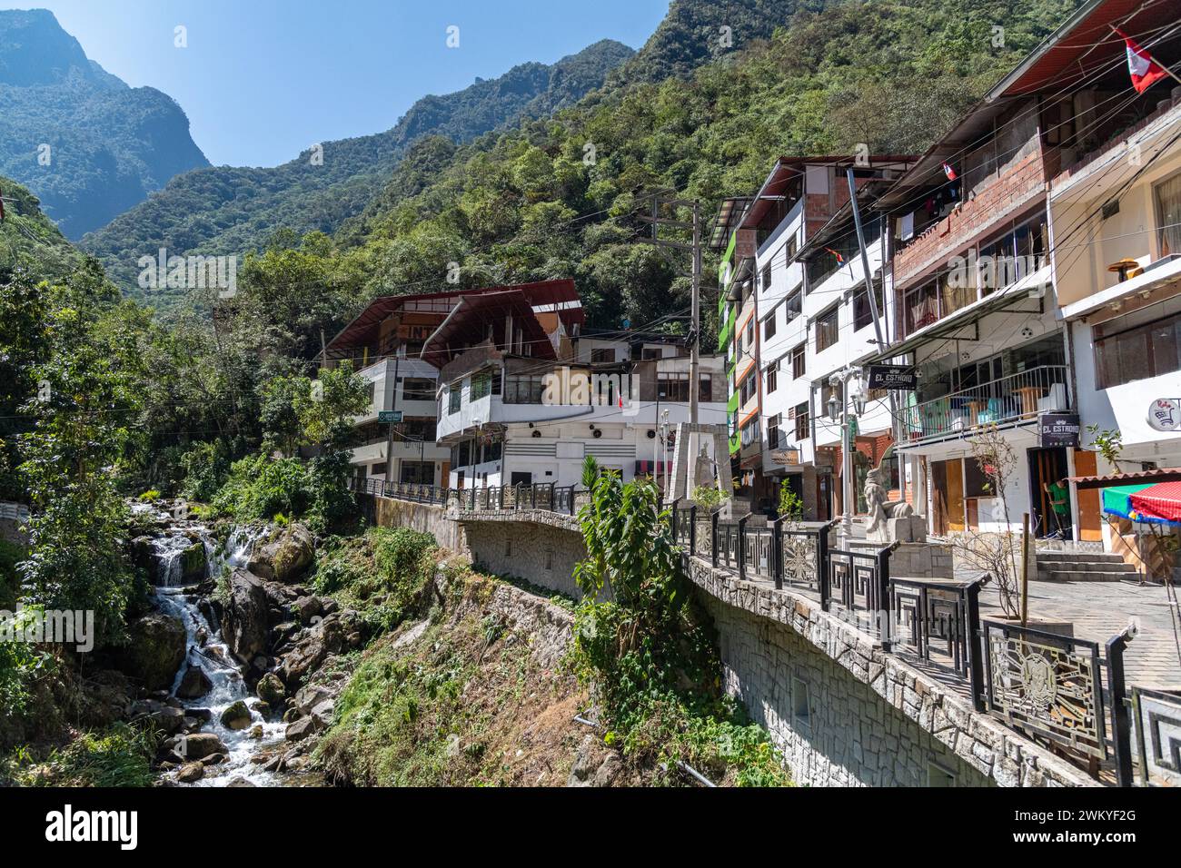 A view of the river flowing through the centre of Aguas Calientes in Peru Stock Photo