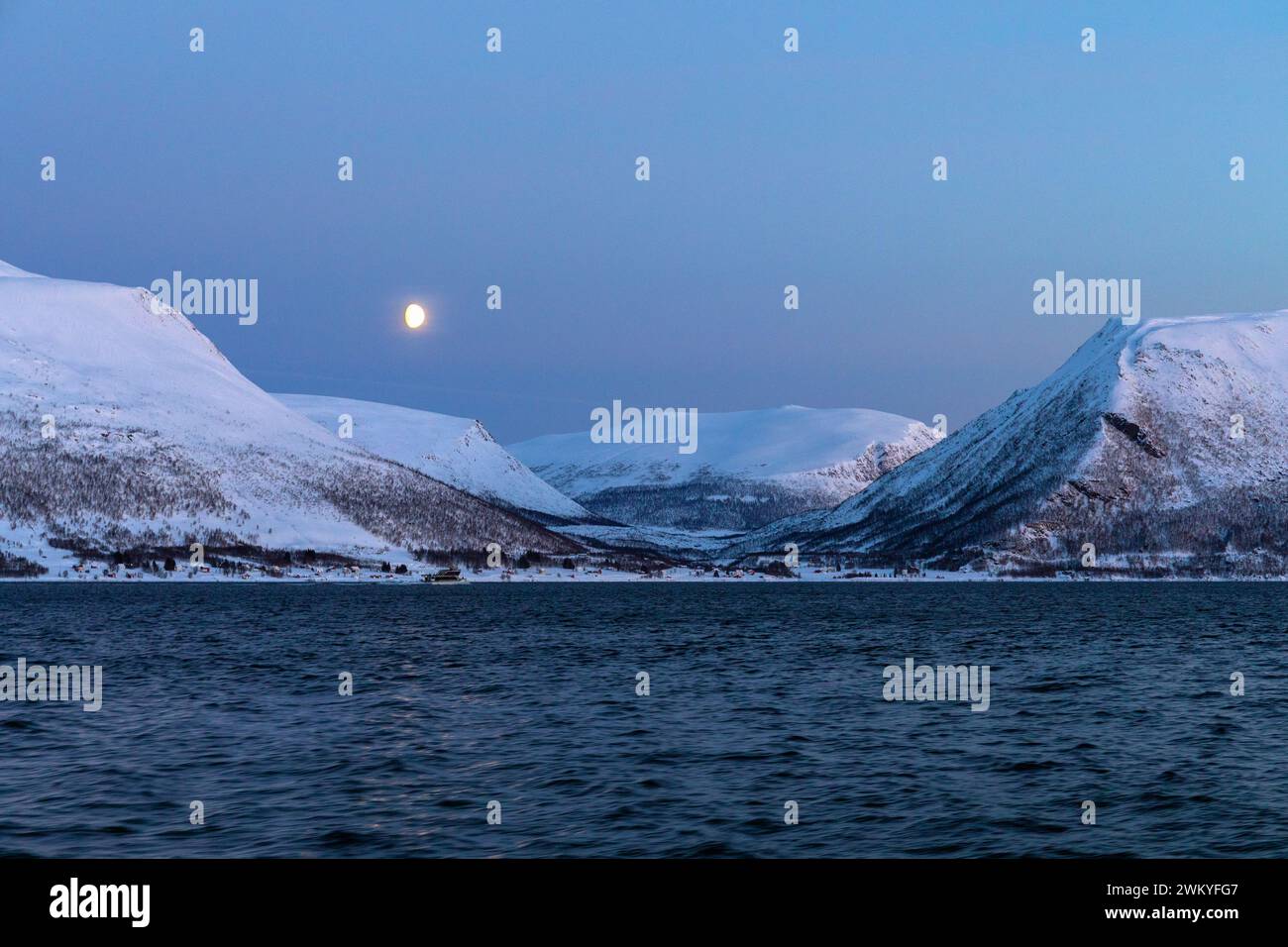 Europe, Norway, near Svensby, Views across Ullsfjorden towards range of Mountains known as 'The Lyngen Alps' Stock Photo